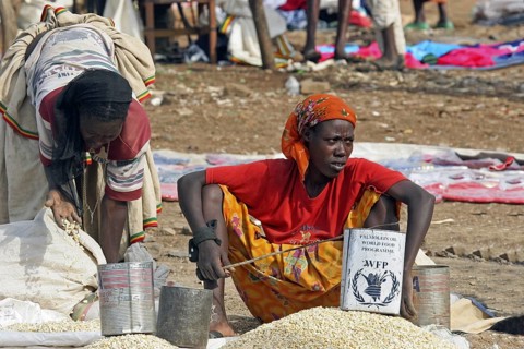 Female vendors selling food on market in Konso