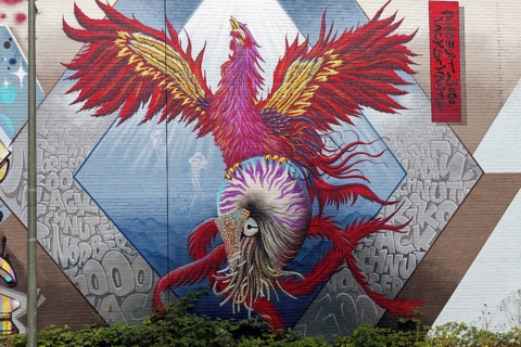 Phoenix holds cephalopod Nautilus in its clutches