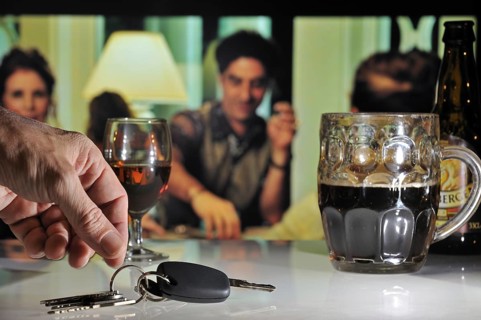Car key and alcohol at party