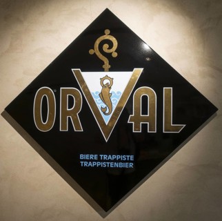 Logo of the Orval Trappist beer on diamond shaped enamelled plate at the Orval Abbey