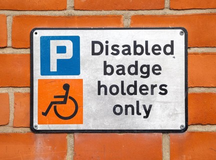 Disabled badge Holders Only parking sign