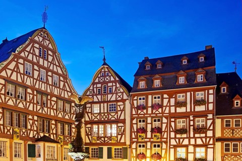 Gabled half-timbered houses on the medieval market square in the evening