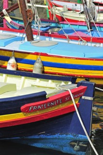 Traditional colourful fishing boats for fishing anchovies in the harbour at Collioure