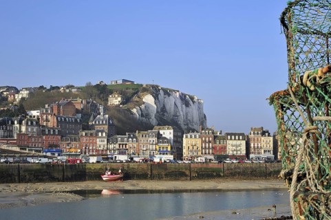 Lobster traps and view over the town Le Treport