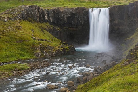 Gufufoss waterfall in summer on the Fjaroara river flowing in the Seyoisfjoerour
