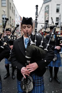 An Irish piper plays a tune in Temple Bar at the start of Trad Fest