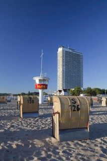 The Maritim Hotel and roofed wicker beach chairs at Travemuende