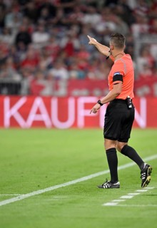 Referee Daniel Schlager decides on penalty kick