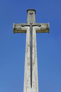 Cross of Sacrifice at military cemetery of the Commonwealth War Graves Commission burial ground for First World War One British soldiers in West Flanders