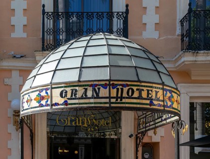 Stained glass canopy entrance to Gran Hotel