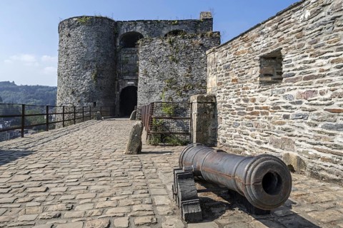 Old cannon at entrance gate of the medieval Chateau de Bouillon Castle
