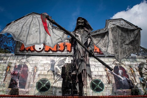 Figure of a winged grim reaper on the facade of a ghost train
