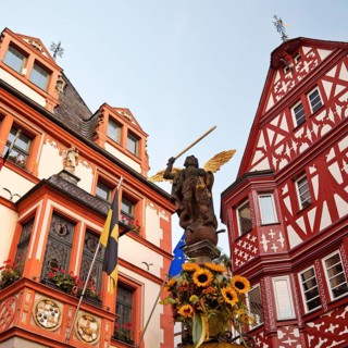 St. Michael's Fountain with town hall and gabled half-timbered house