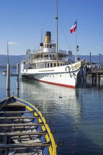 Swiss historic Belle Epoque paddle steamboat Savoie in the old port at Yvoire along Lake Geneva