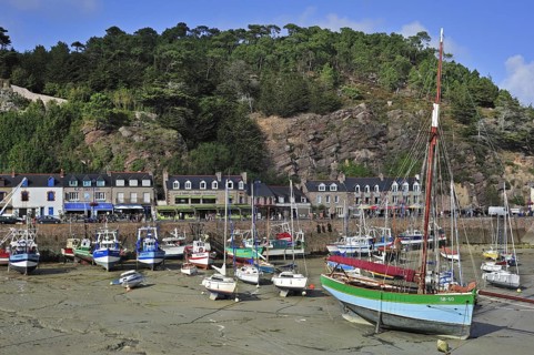 Colourful fishing boats in the harbour of Erquy