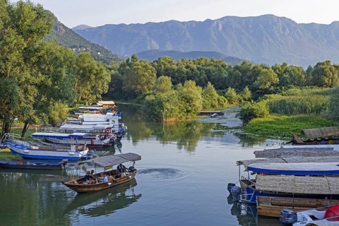 Tourist boats at Virpazar on the Crmnica river which flows into Skadar Lake
