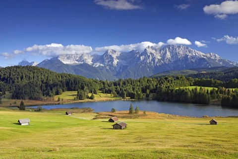 The Karwendel Mountain Range and huts along lake Gerold
