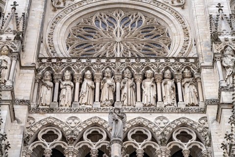 Statues of the Kings and rose window on the west facade of Notre Dame d'Amiens Cathedral