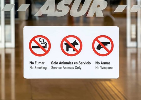 Security sign at airport terminal building
