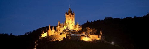 Illuminated Reichsburg Cochem in the evening