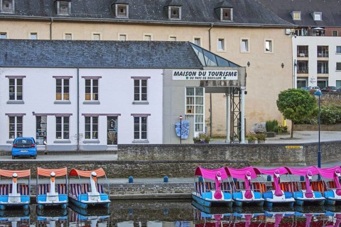 Pedal boats in front of Archeoscope and Maison du Tourisme