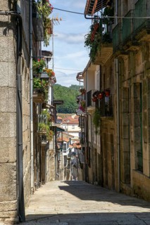 Houses on steep narrow street in medieval town