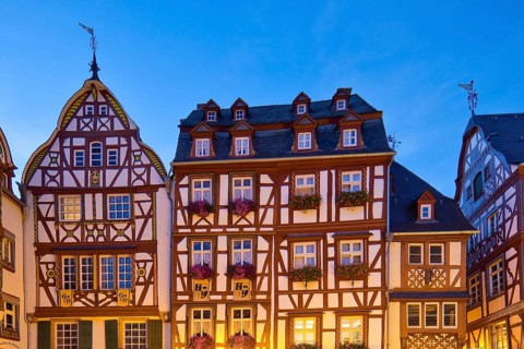 Gabled half-timbered houses on the medieval market square in the evening