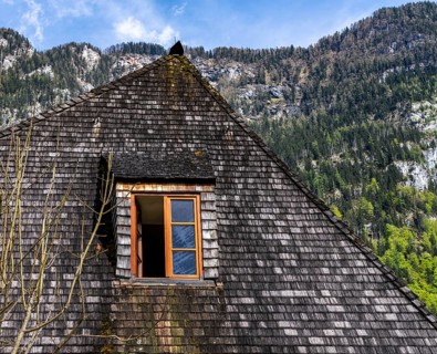 Windows in the attic of a Bavarian wooden house