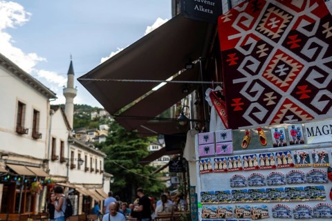 Street from the restaurant and souvenir area to the city of Gjirokaster or Gjirokastra. Albanian