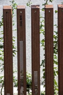 Line-up of 1392 posts representing the dead chart of the hospital at the Lijssenthoek Military Cemetery in the Ypres Salient