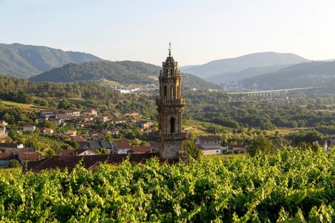 Tower of church Igrexa de Santo Andre surrounding countryside