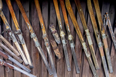 Old wooden skis with spring binding
