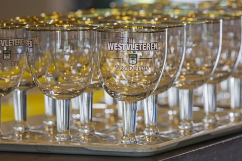 Tray with empty Trappist Westvleteren beer glasses in cafe