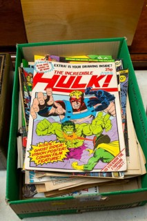 Box of The Incredible Hulk comics on display in auction room
