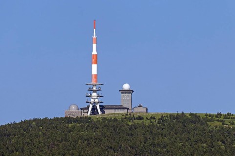 Old transmission tower and new television tower