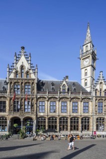 De Post shopping centre and luxury hotel 1898 The Post with clock tower at the Korenmarkt
