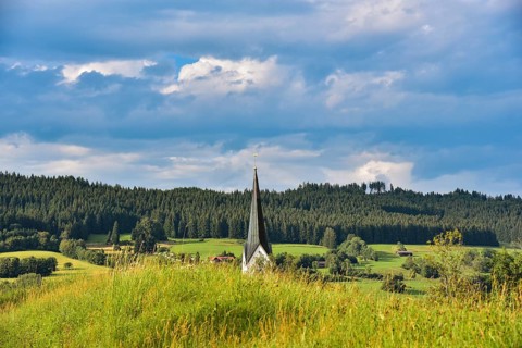 Church tower of the Catholic parish church Stankt Pelagius in the municipality of Weitnau in Oberallgaeu