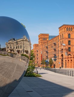 Reflection of Izrael PoznaÅ„ski's Palace and Manufaktura