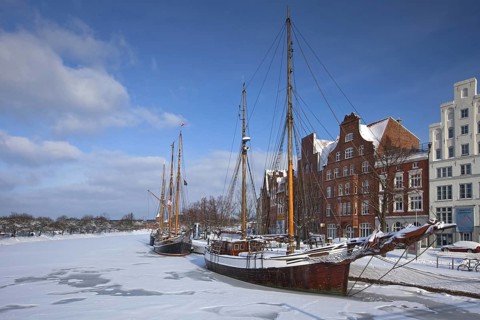 Sailing ship in the snow in winter in the harbour museum at the Hanseatic City of Luebeck