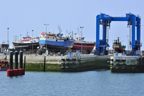 Trawler fishing boats on shipbuilding yard for maintenance works in the Guilvinec port