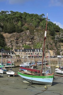 Colourful fishing boats in the harbour of Erquy