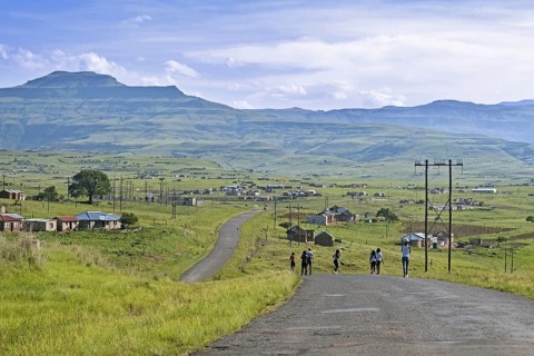 Drakensberg Mountain Range and rural settlement in the countryside of Injisuthi area in KwaZulu-Natal