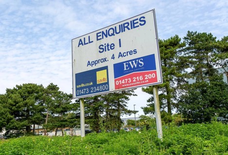 Commercial property estate agent sign for development site
