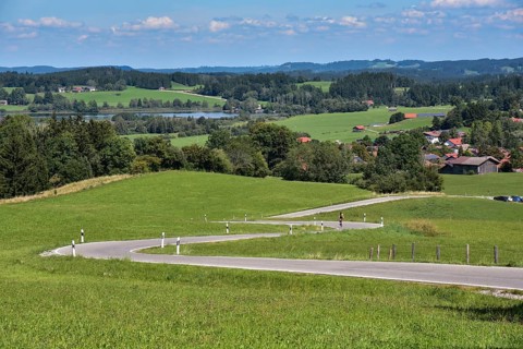 The country road up the Auerberg near Benbeuern in the district of Weilheim-Schongau
