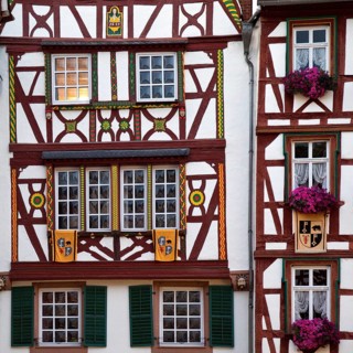 Facades of gabled half-timbered houses on the medieval market square