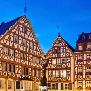 Gabled half-timbered houses on the medieval market square in the evening