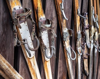 Old wooden skis with spring binding