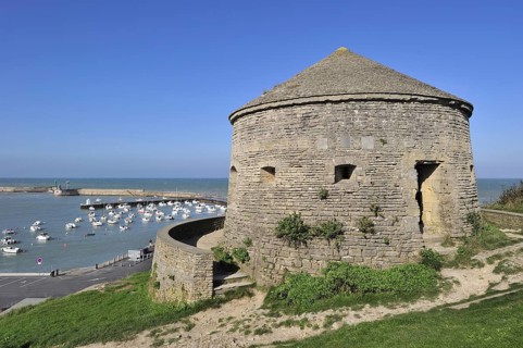 The tower Tour Vauban and the harbour at Port-en-Bessin