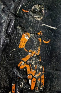 Detail of medieval epitaph on gravestone