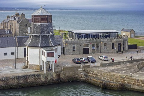 The old harbour master's control tower at entrance to the Aberdeen port